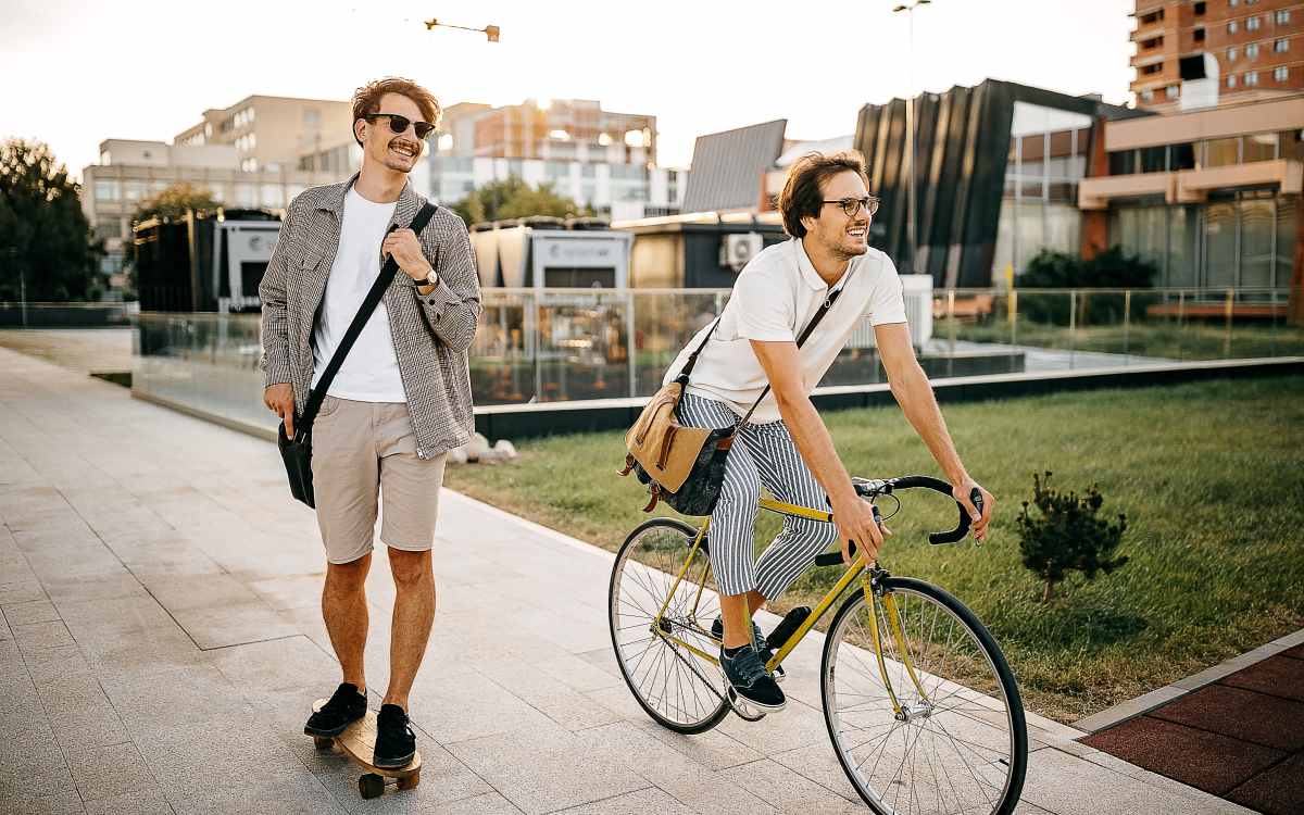 Residents riding bikes and skateboard at Summit Rose Apartments in Escondido, California