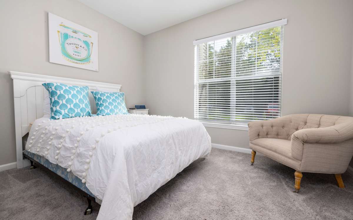 Cozy bedroom at The Grove at Oakbrook in Summerville, South Carolina