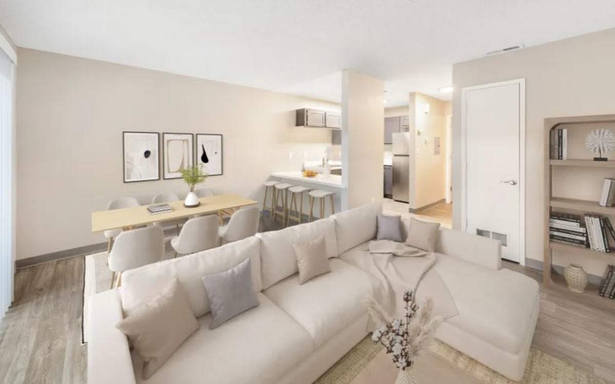 Wide view showcasing open layout of living room and an open kitchen at Kirman Garden in Reno, Nevada