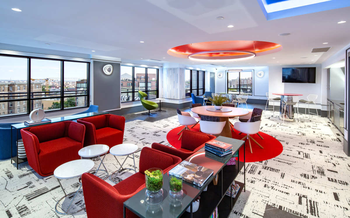 Brightly Lit Lounge Area With City Views at AdMo Heights in Washington, District of Columbia
