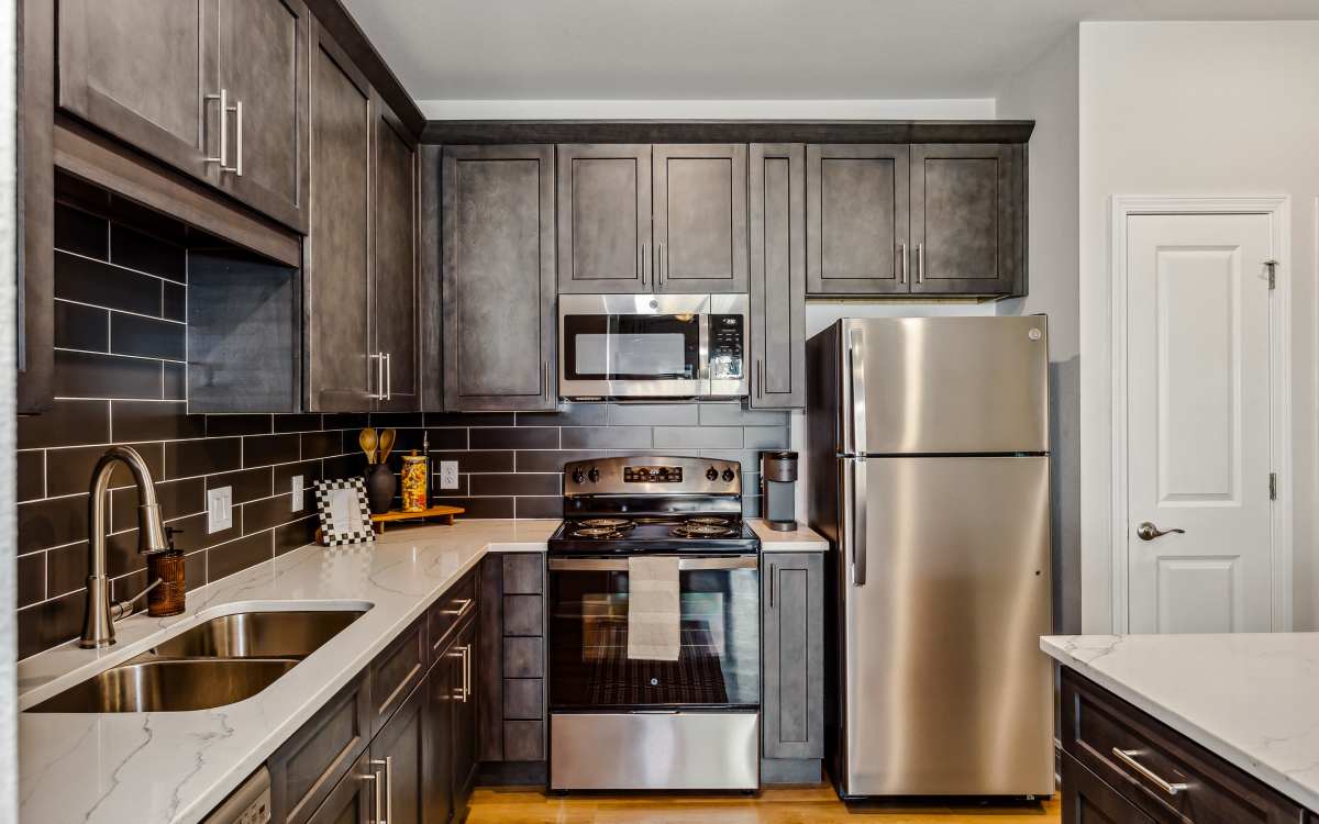 A model kitchen in one of our furnished apartments at City North in Pensacola, Florida