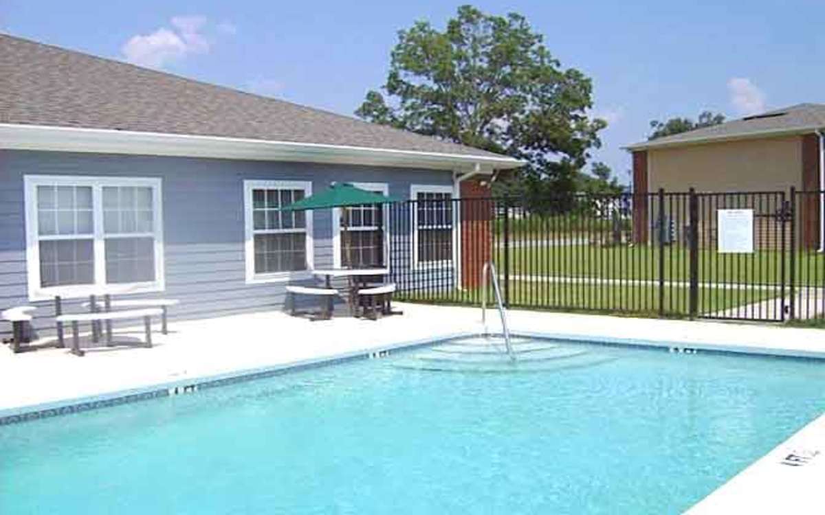Swimming pool at Ochlockonee Pointe Apartments in Midway, Florida