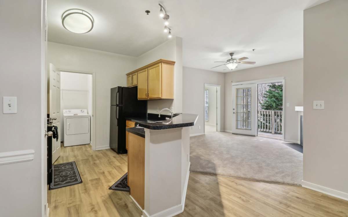 Kitchen with wooden flooring at Malvern Lakes Apartments in Fredericksburg, Virginia