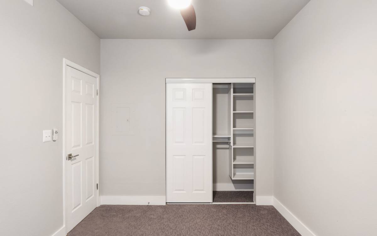 Unfurnished bedroom with ceiling fan at Easton in San Antonio, Texas