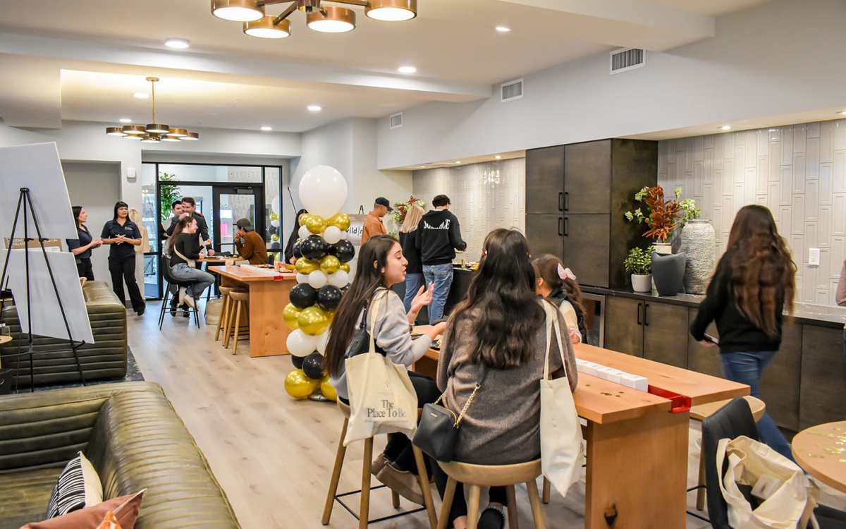 Resident drinking a matcha latte at Stone Village Apartments in Reno, Nevada