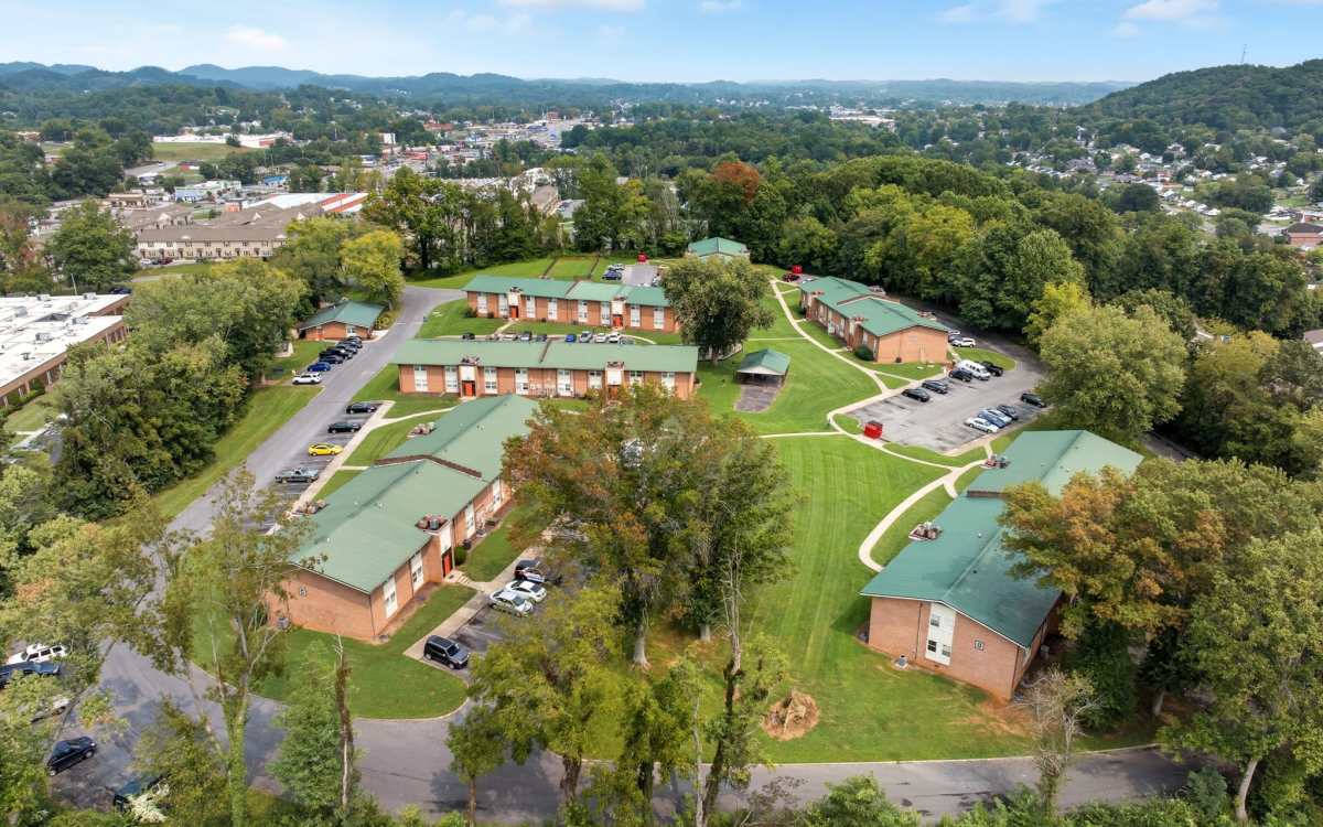 Community external view with parking at Bristol Square Apartments in Bristol, Tennessee