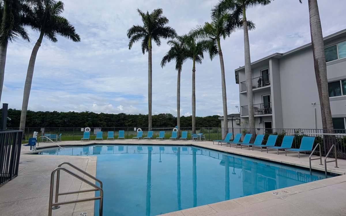 Serene swimming pool at Sunset Bay Apartments in Cutler Bay, Florida