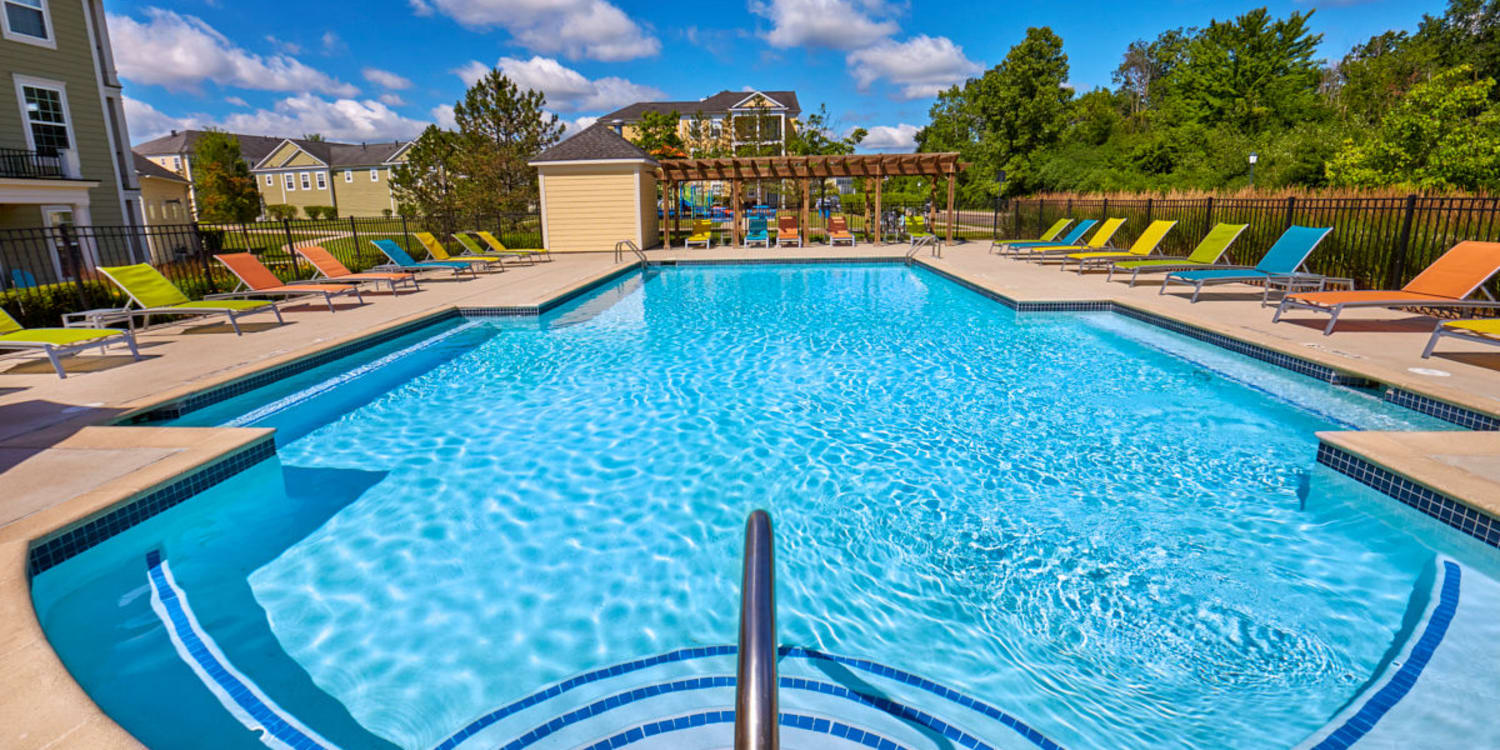 Resort-Style Swimming Pool with Sun Deck at Uptown in Canton in Canton, Michigan
