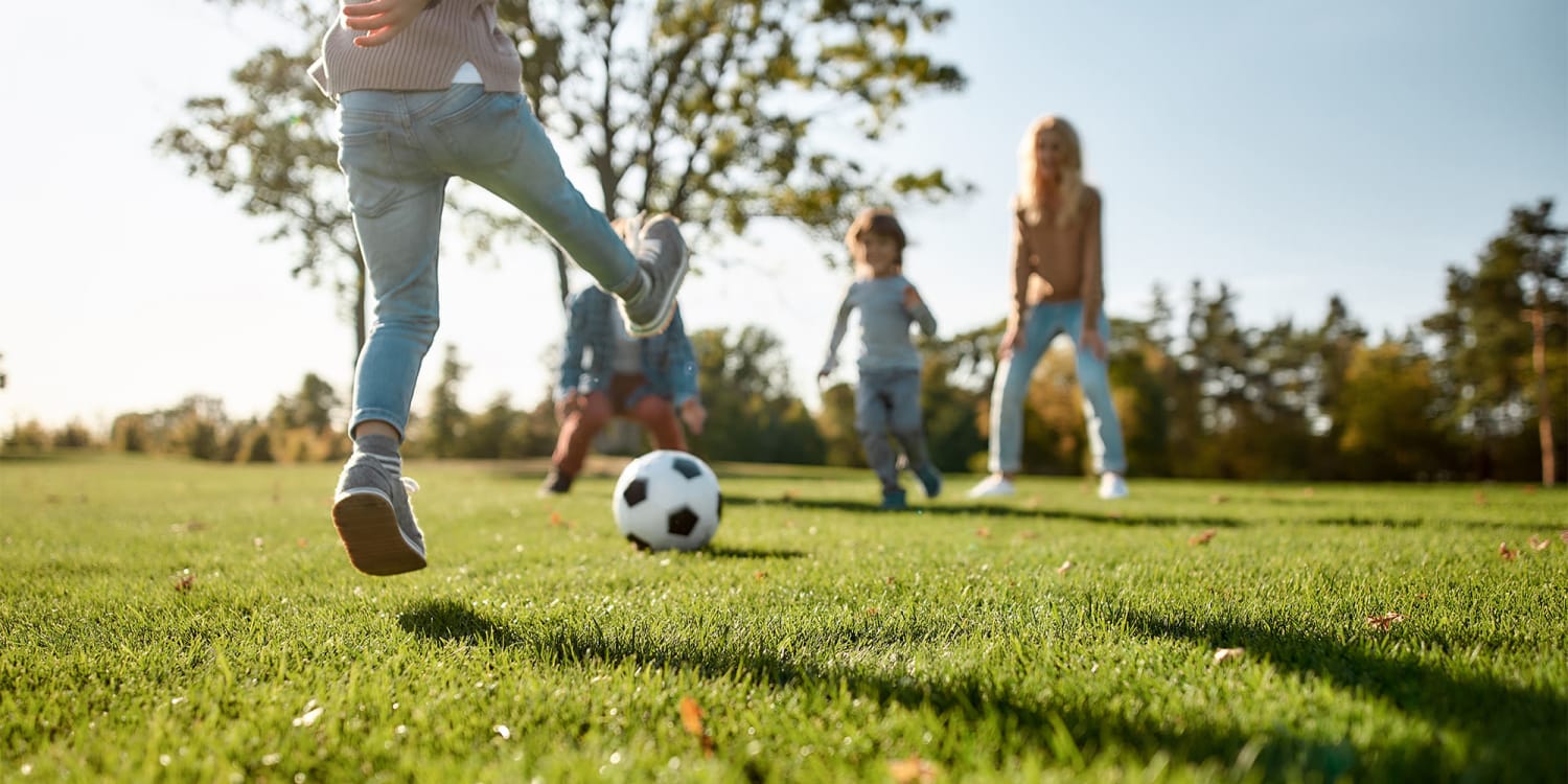 Children playing soccer at Villa Encantada in San Diego, California