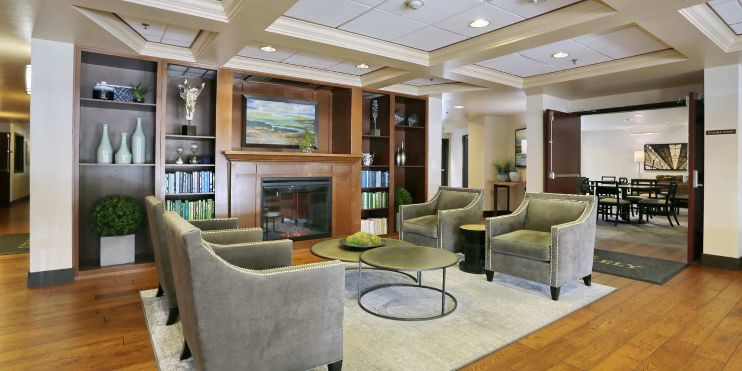 Community lounge area with tables and lots of seating at The Blakely in Shoreline, Washington