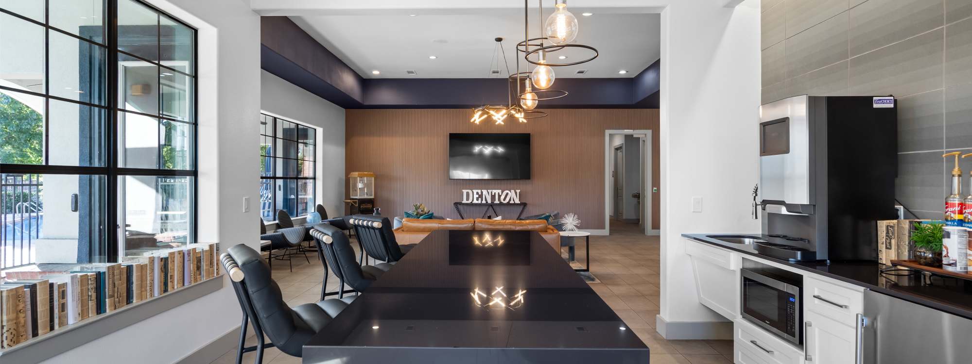 Student apartments with swimming pool at Midtown 905 in Denton, Texas