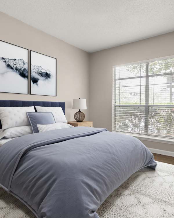 Model bedroom with plush carpeting at Chattahoochee Ridge in Atlanta, Georgia