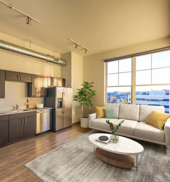 Stainless-steel appliances in a home with bright windows at Reside MKT in Wilmington, Delaware