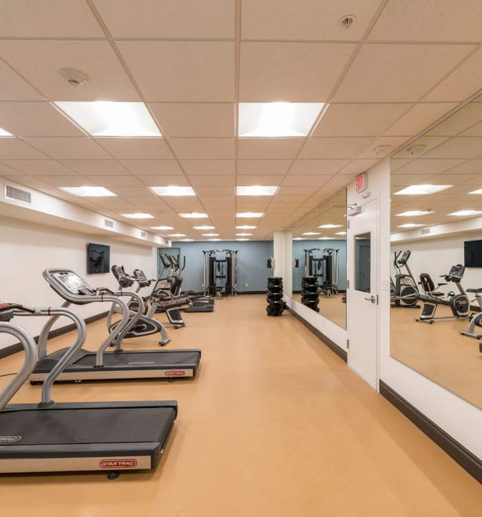 Treadmills in the fitness center at Reside MKT in Wilmington, Delaware