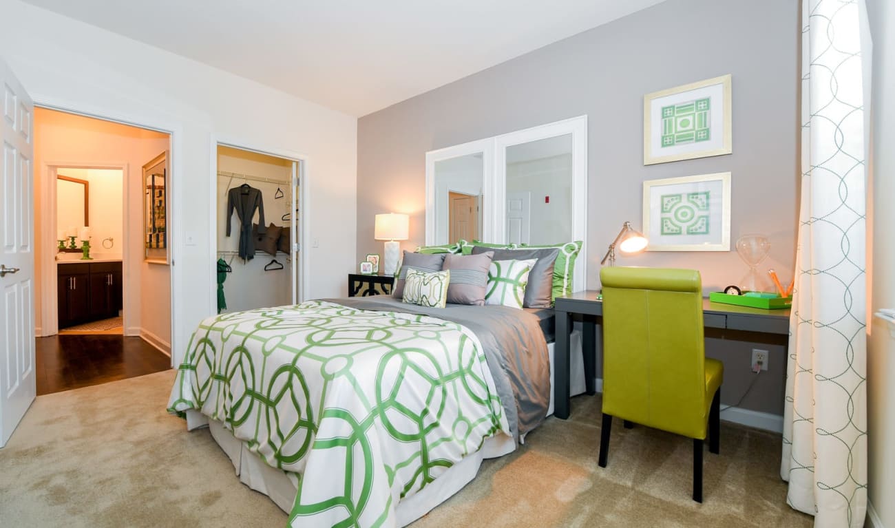 Bedroom with a desk and chair at Reserve at Wauwatosa Village in Wauwatosa, Wisconsin