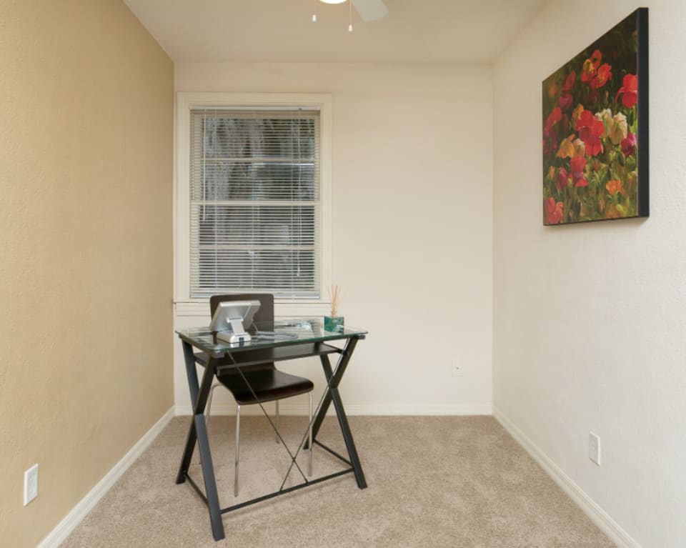 Bedroom Interior With Desk And Chair at St. Johns Landing Apartments in Green Cove Springs, Florida
