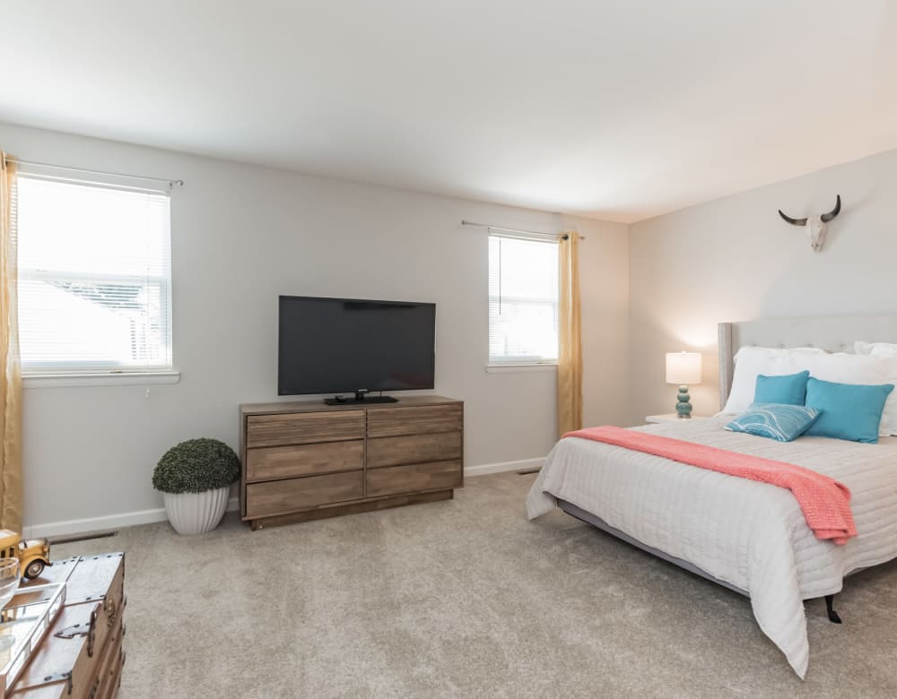 A spacious bedroom at The Springs Townhomes in Parkville, Maryland