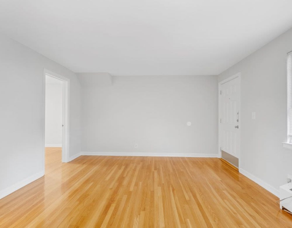 Large room with wood floors at Eagle Rock Apartments at Maplewood in Maplewood, New Jersey