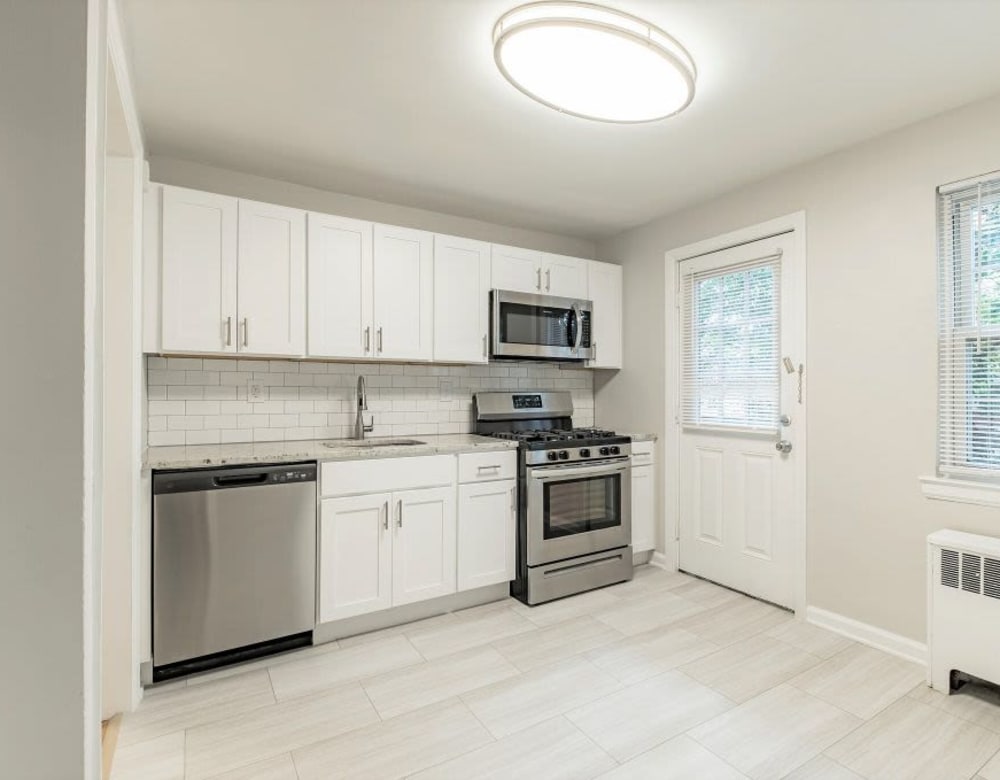 Kitchen with stainless steel appliances at Eagle Rock Apartments at Maplewood in Maplewood, New Jersey