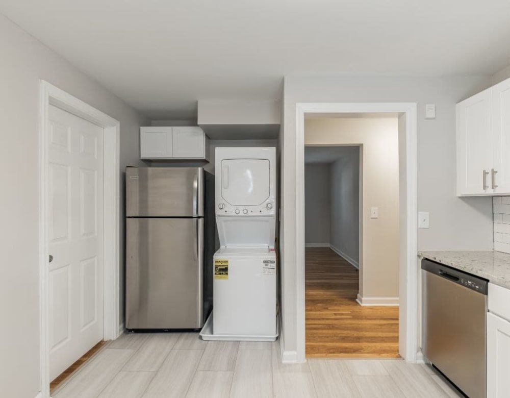 Fridge and washer/dryer combo in the kitchen at Eagle Rock Apartments at Maplewood in Maplewood, New Jersey