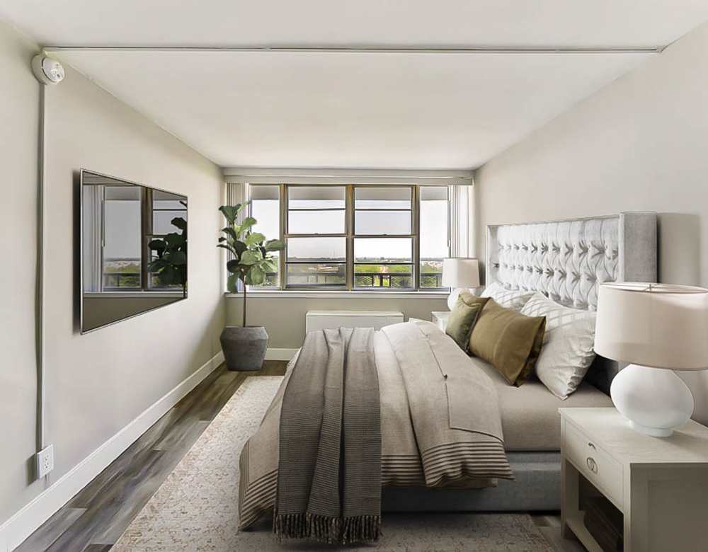 Modern bedroom with large window at Chestnut Hill Tower in Philadelphia, Pennsylvania