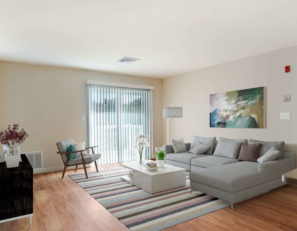 Comfortable and cozy living room at Bay Ridge at Nashua Apartments in Nashua, New Hampshire