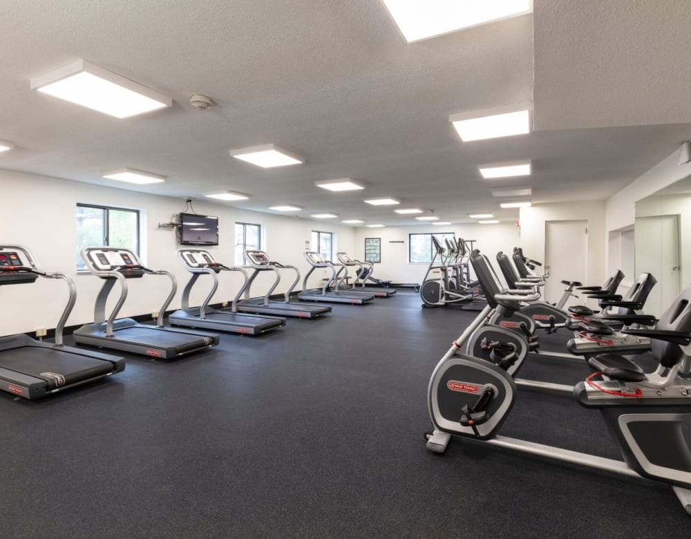 Fitness center with plenty of machines at Eagle Rock Apartments at MetroWest in Framingham, Massachusetts