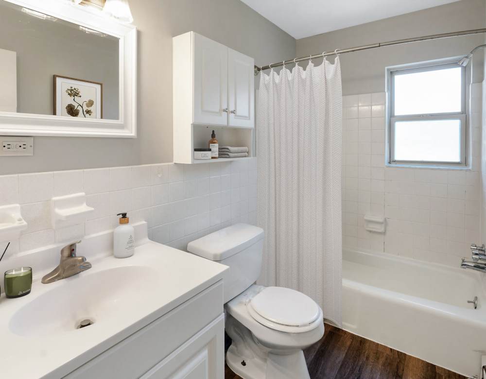Renovated bathroom with new appliances at Eagle Rock Apartments at Malvern in Malvern, Pennsylvania