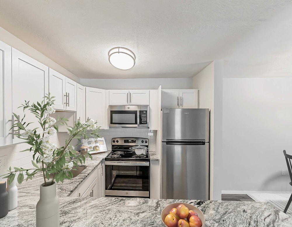 Refrigerator and other kitchen appliances at our Newly Updated Apartments in Westborough
