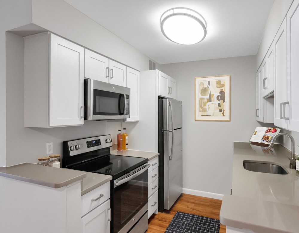 Our Cozy Apartments in Nashua, New Hampshire showcase a Kitchen