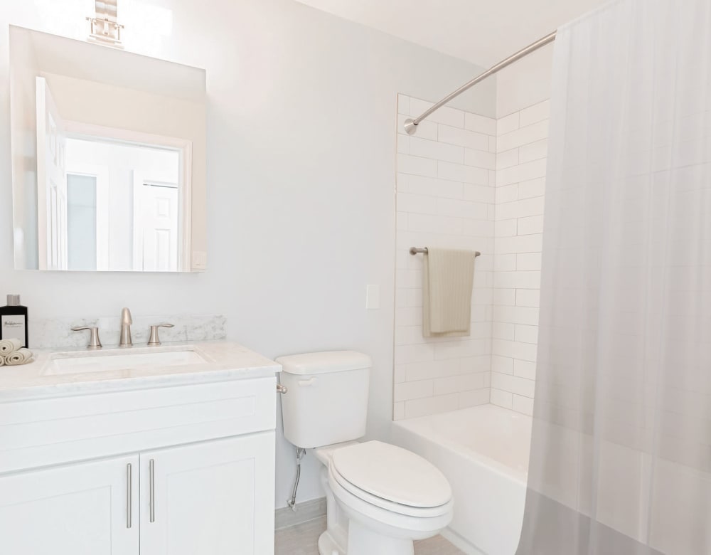 Our Modern Apartments in Amityville, New York showcase a Bathroom