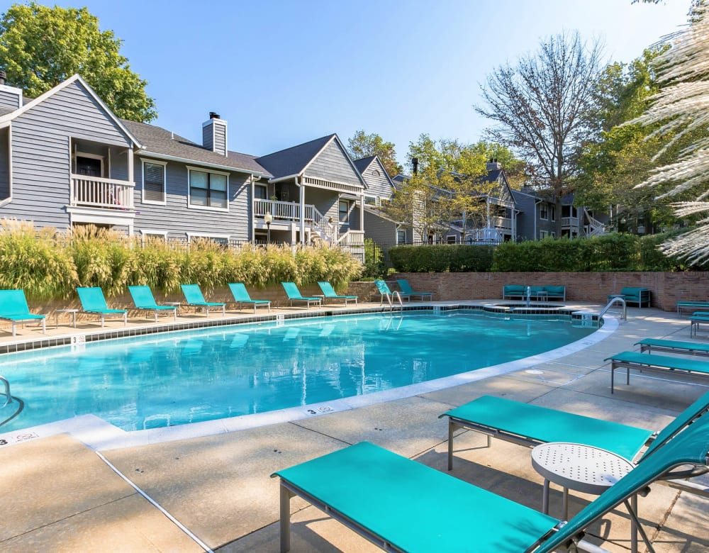 Pool side with sun lounger  at Eagle Rock Apartments at Columbia in Columbia, Maryland