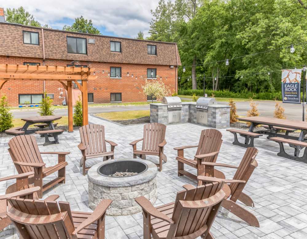 Fire pit at  Eagle Rock Apartments at Hudson in Hudson, New Hampshire