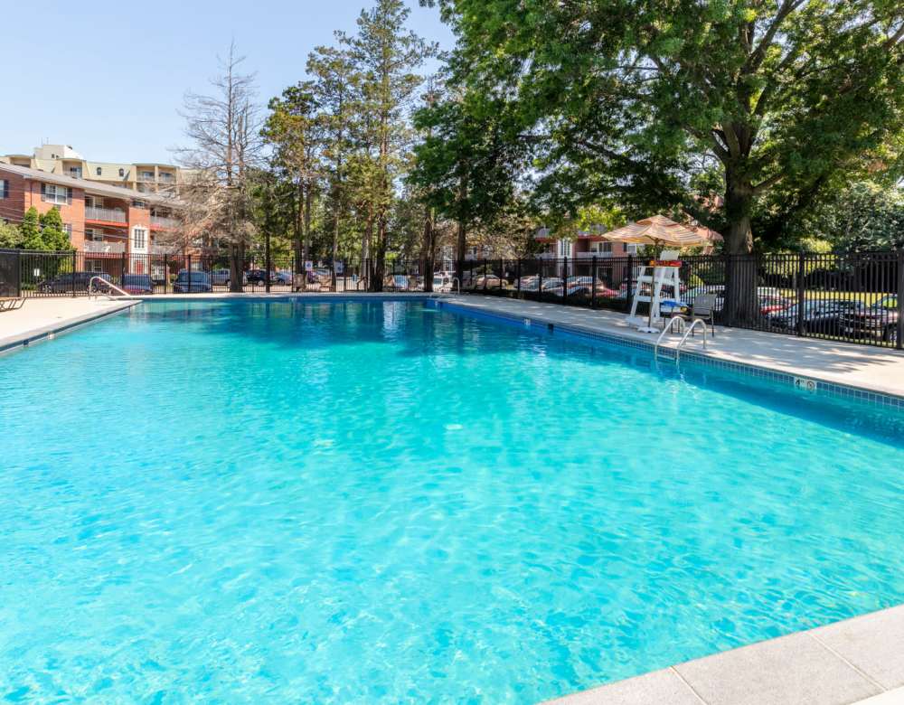 Sparkling pool at Eagle Rock Apartments at Framingham memory care in Framingham, Massachusetts