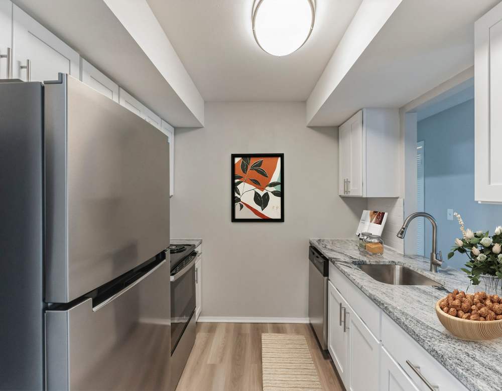 Modern kitchen at Eagle Rock Apartments at Framingham memory care in Framingham, Massachusetts