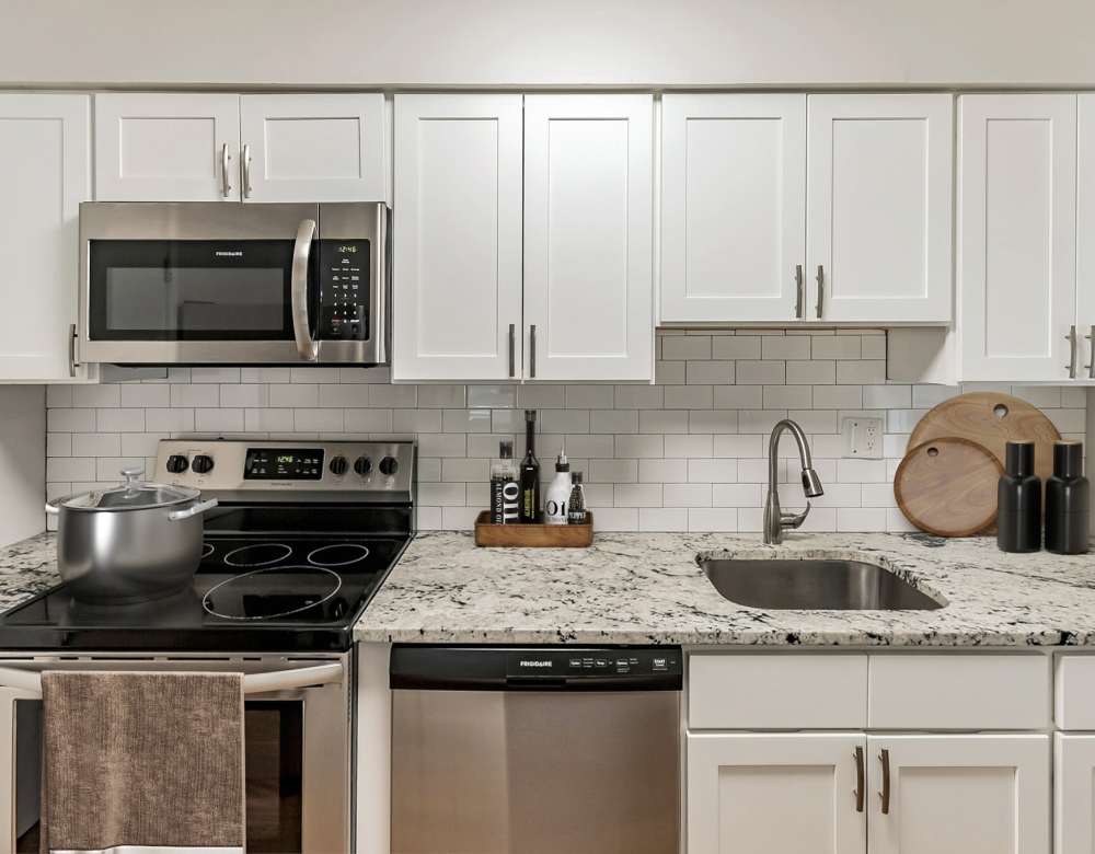 Kitchen with modern appliances at Ramblewood Village Apartments in Mount Laurel, New Jersey