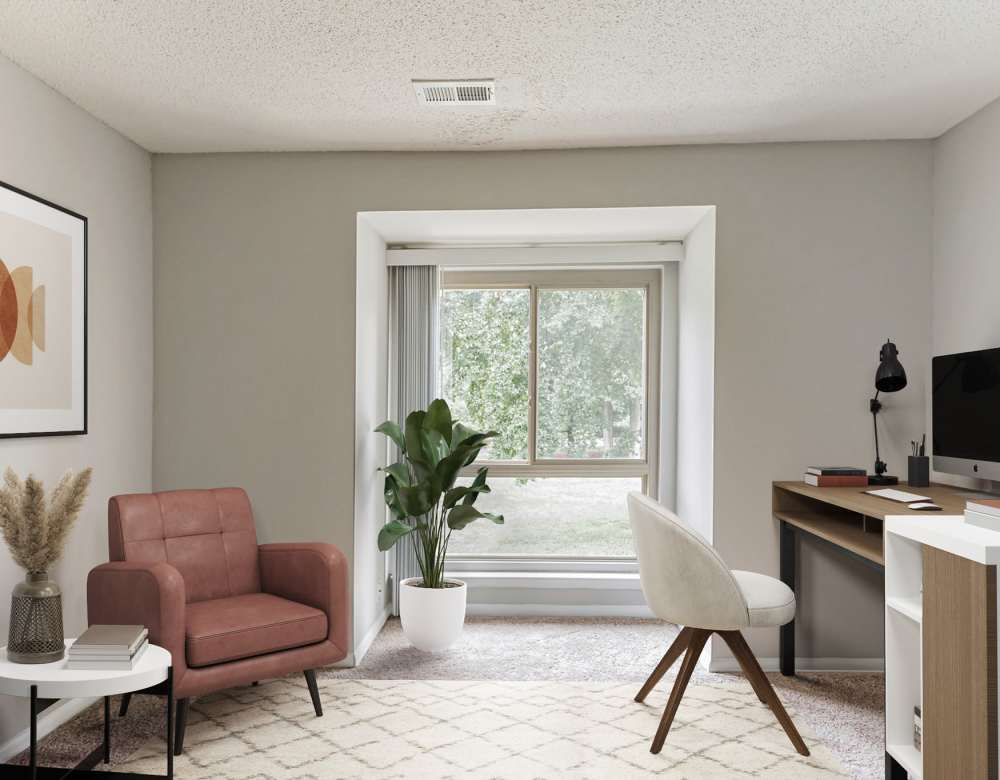 Living area with large window at Ramblewood Village Apartments in Mount Laurel, New Jersey