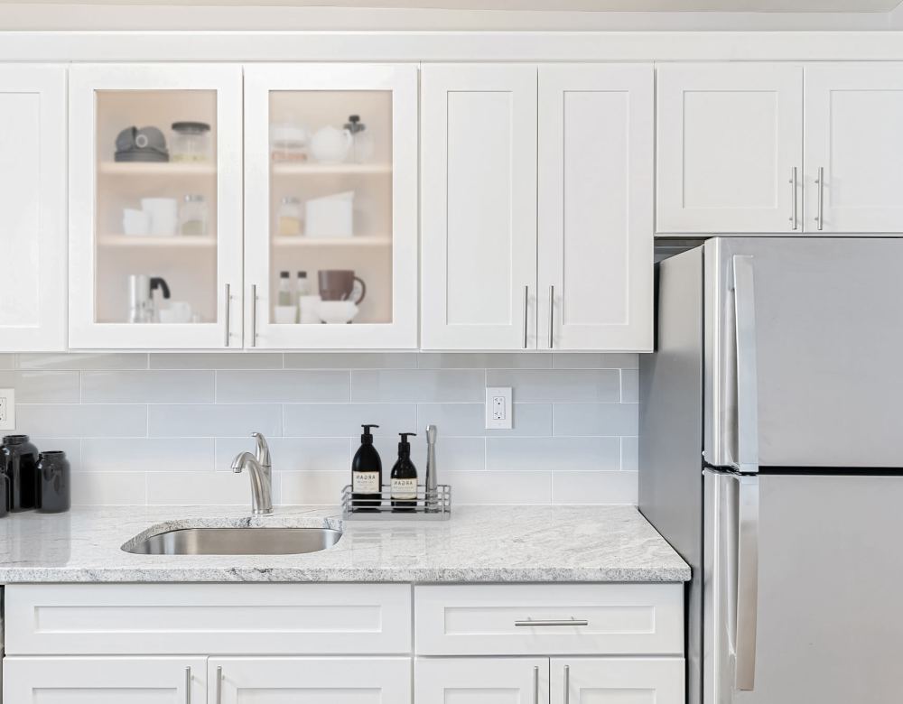 Granite Counterop with sink at Eagle Rock Apartments at Carle Place in Carle Place, New York