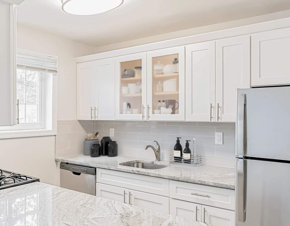 Modern kitchen counters at Eagle Rock Apartments at Carle Place in Carle Place, New York
