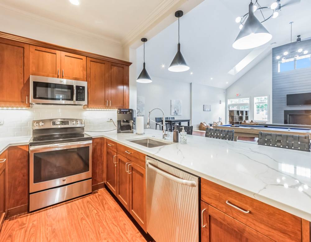 Fully equipped kitchen with stainless steel appliances at Park Village West in Westborough, Massachusetts