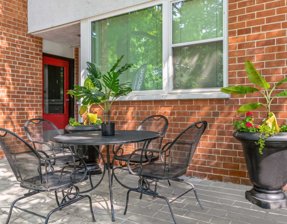 Outdoor patio with seating area at Cherokee Apartments in Philadelphia, Pennsylvania