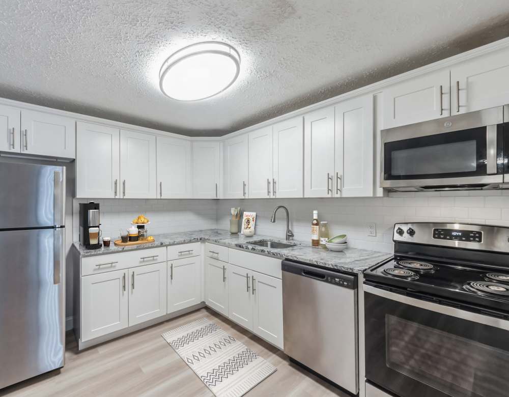 Kitchen with Countertop at Eagle Rock Apartments at Manchester in Manchester, New Hampshire