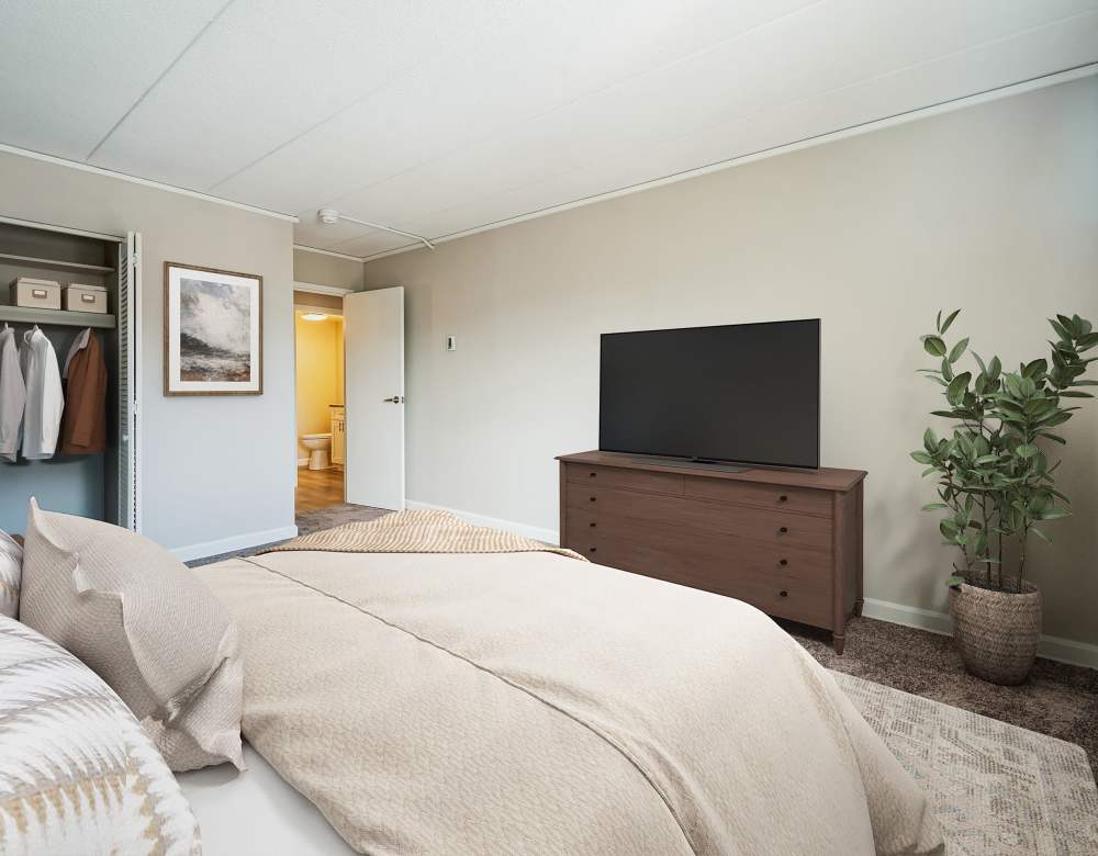 Modern bedroom at Eagle Rock Apartments at MetroWest in Framingham, Massachusetts