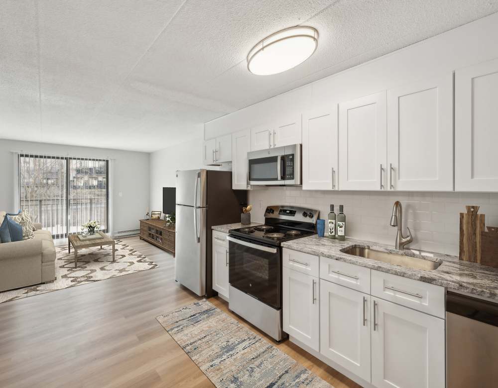 Dining room to spend time with family at Eagle Rock Apartments at MetroWest in Framingham, Massachusetts