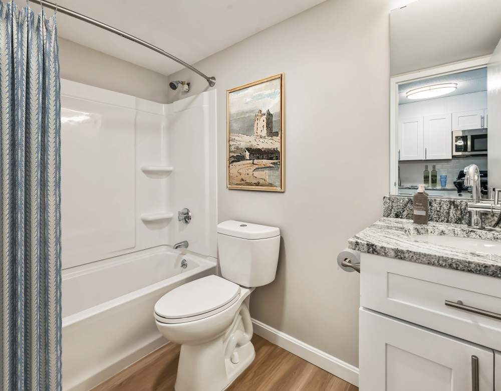 Clean and bright bathroom at Eagle Rock Apartments at MetroWest in Framingham, Massachusetts