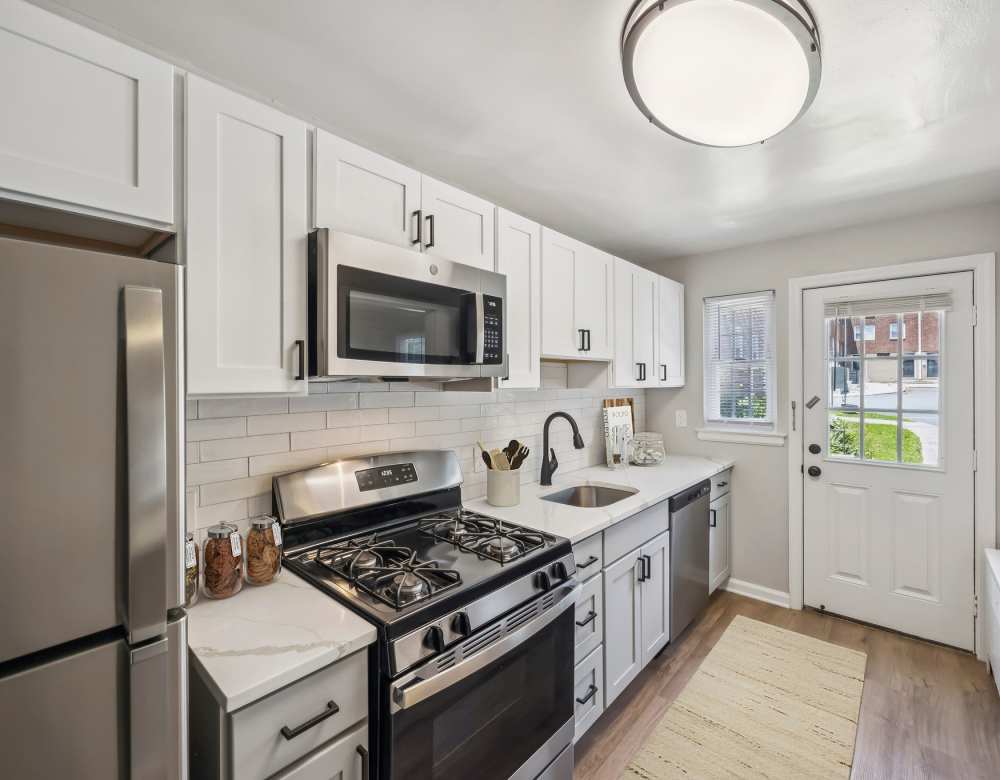 Kitchen with stainless steel appliances at Eagle Rock Apartments at Maplewood in Maplewood, New Jersey