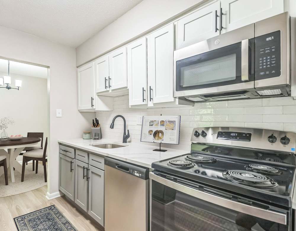Kitchen with modern appliances at Ramblewood Village Apartments in Mount Laurel, New Jersey