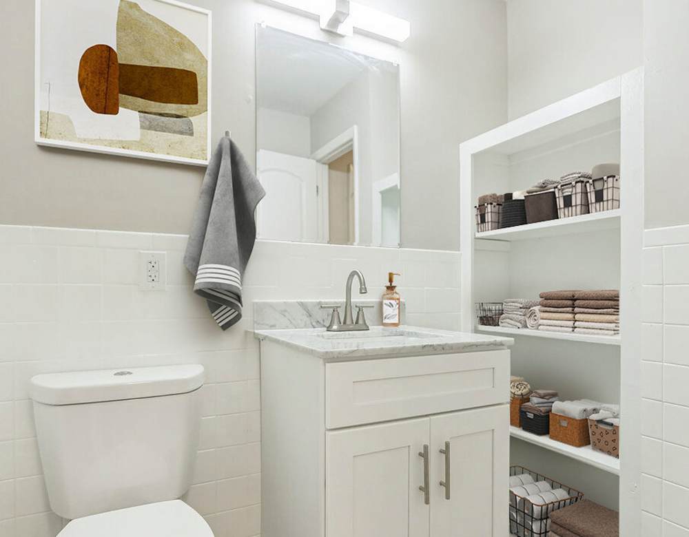 Stylish bathroom with lots of storage space at Northway Eleven, An Eagle Rock Community in Ballston Lake, New York
