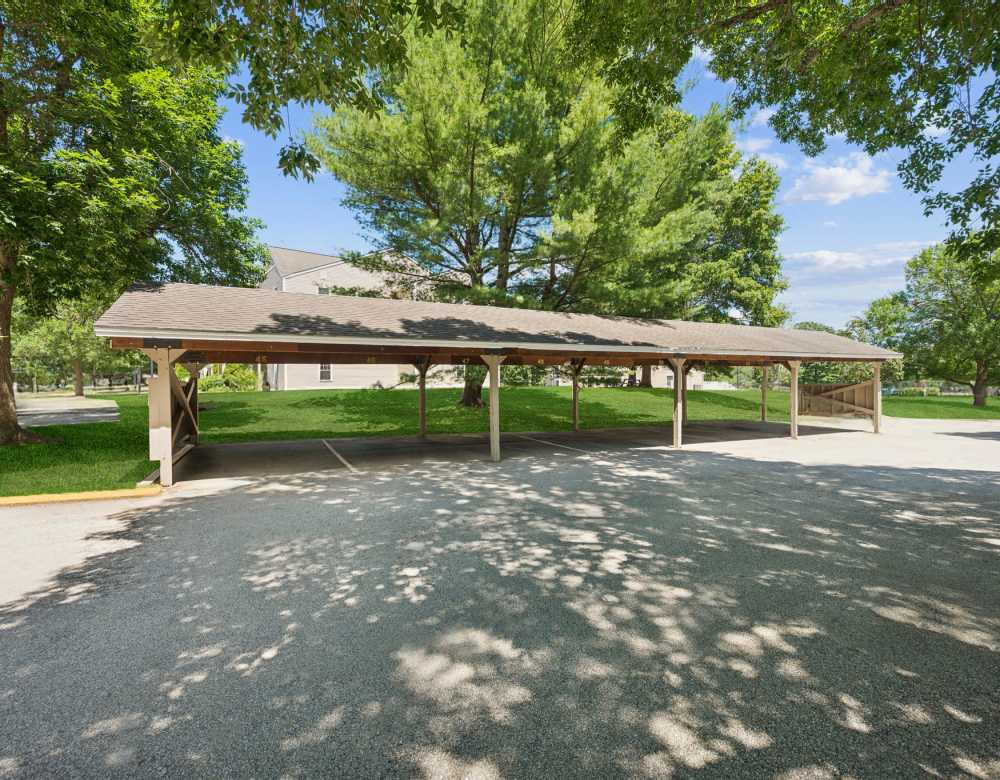 Covered carport parking at Bay Ridge at Nashua Apartments in Nashua, New Hampshire