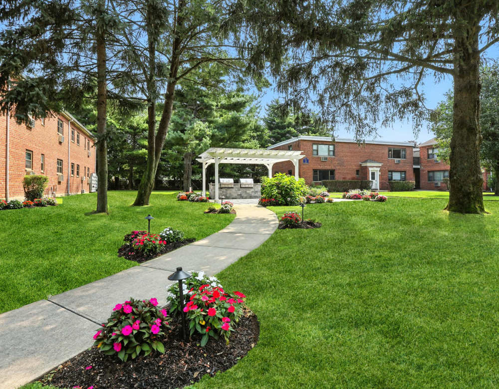 Apartment building walkway at Eagle Rock Apartments at Hicksville/Jericho in Hicksville, New York
